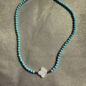 Dainty Turquoise Angel, Mother of Pearl, Golden Hematite. Gold filled clasp.